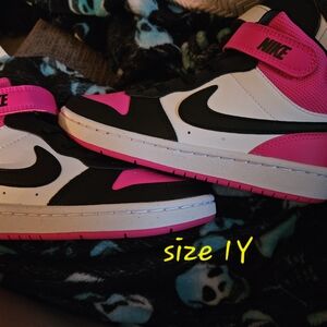 Nike Pink and Black Sneakers High-Top Design